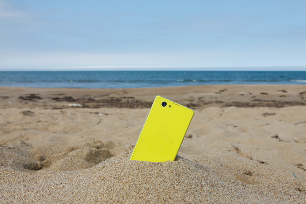 Smartphone-in-spiaggia Smartphone-in-spiaggia