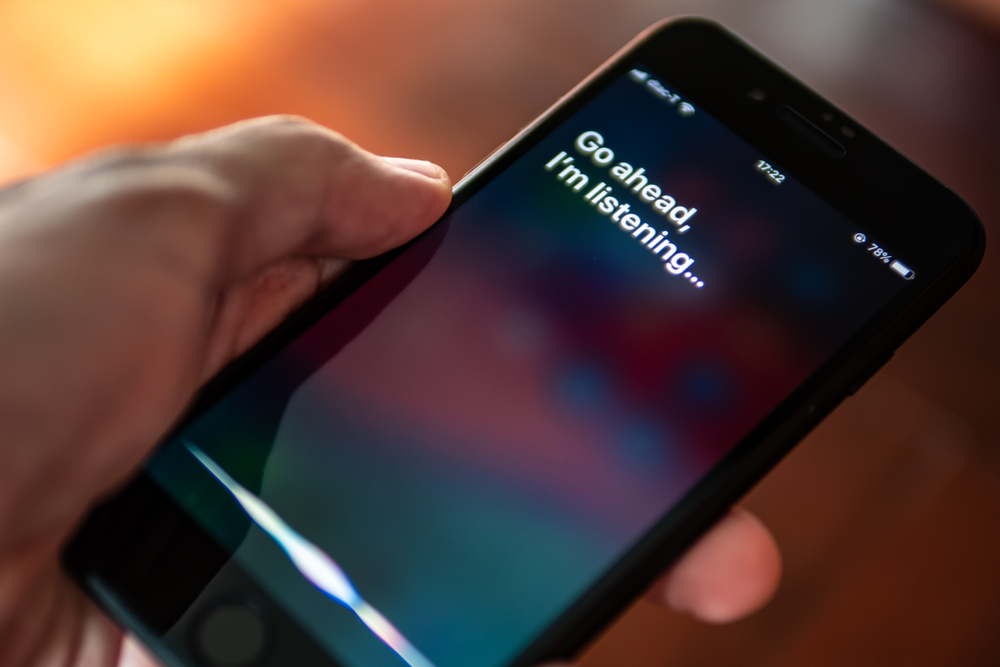 Accesso a Siri su iPhone Accesso a Siri su iPhone