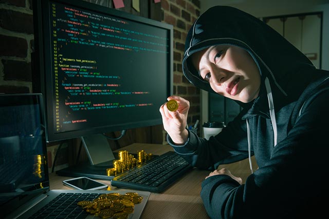 Hacker con Bitcoin