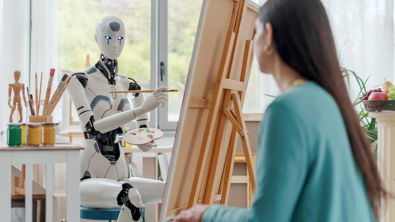 robot-che-dipinge-ritratto-donna